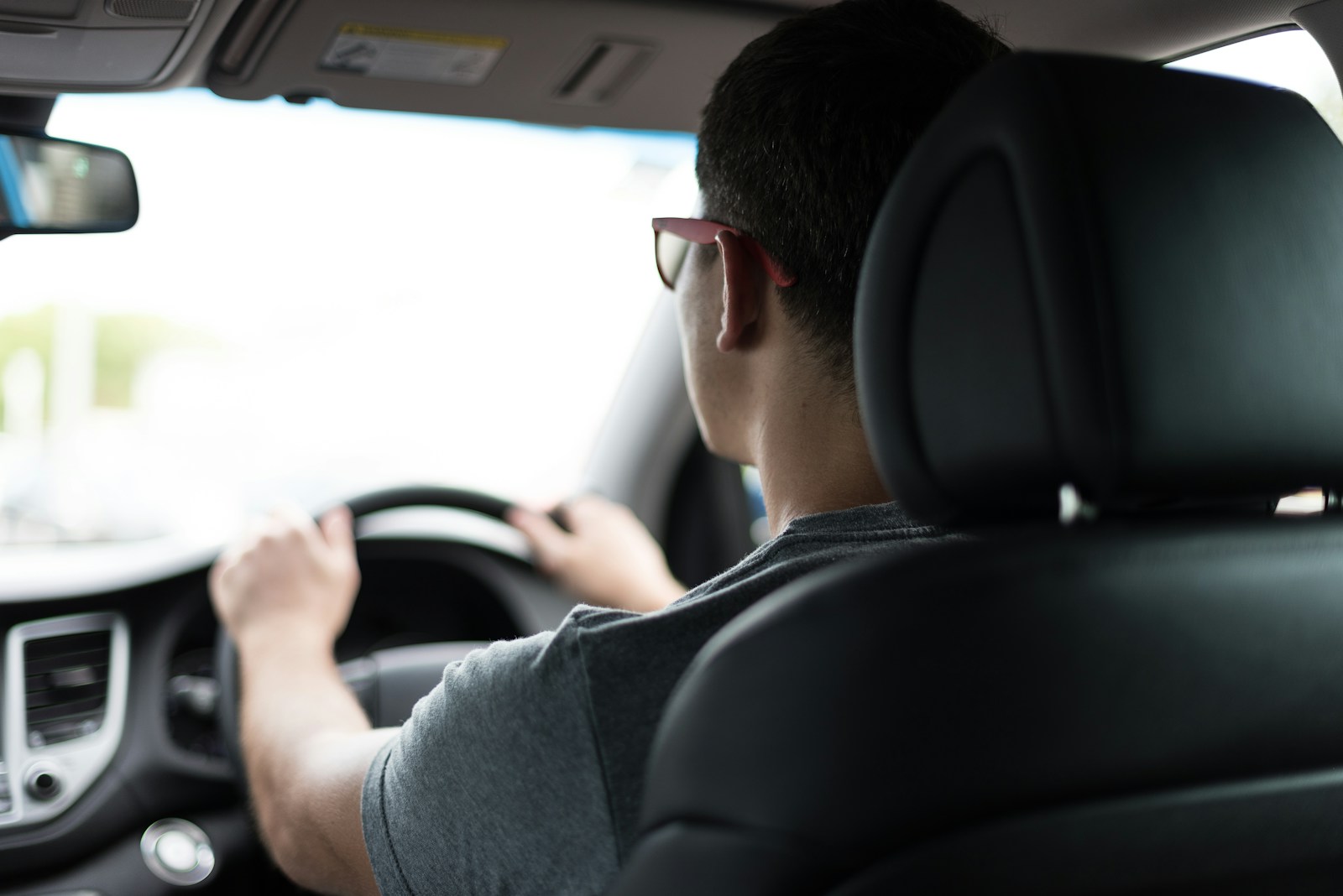 man driving car during daytime, auto